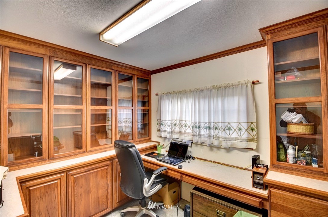 238 Stowell Road Salkum, WA 98582 - Photo 9 of 26 a view of a workspace with furniture and a window