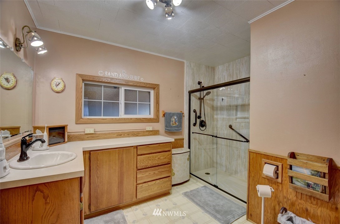 238 Stowell Road Salkum, WA 98582 - Photo 10 of 26 a kitchen with a refrigerator sink stove and cabinets