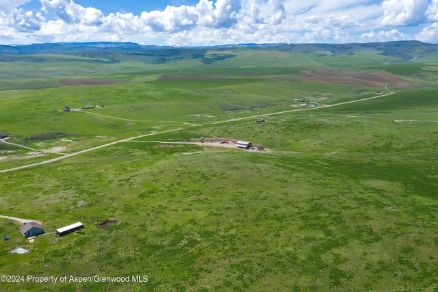 a view of a field with an empty space