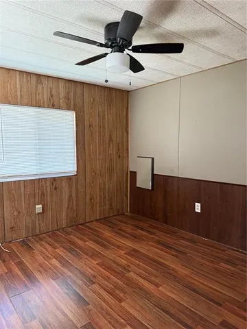 a view of a livingroom with a kitchen