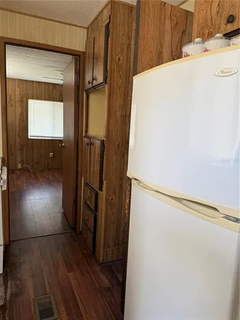 a view of gallery with wooden floor