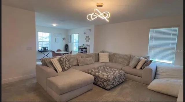 a kitchen with a sink cabinets and stove