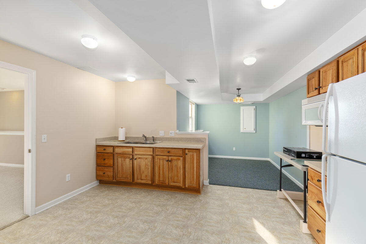 8296 Golfside Drive Jenison, MI 49428 - Photo 36 of 39 lower level kitchenette