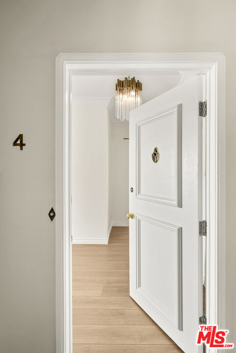 1326 Londonderry View Drive, Unit 4 Los Angeles, CA 90069 - Photo 1 of 29 a view of an entryway with wooden floor