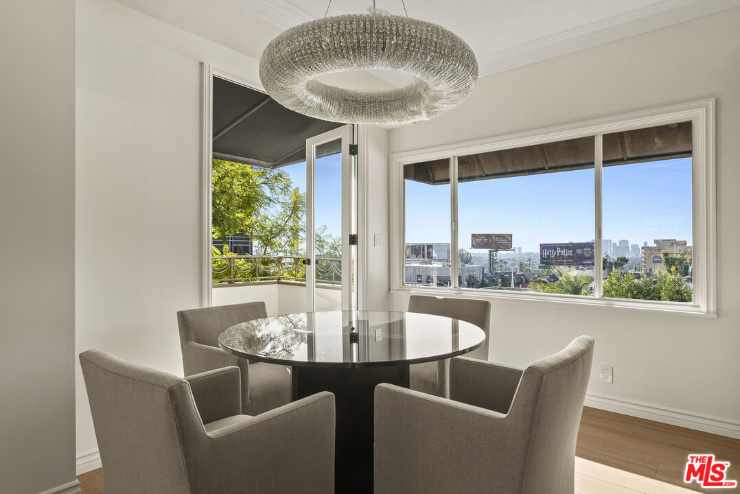 1326 Londonderry View Drive, Unit 4 Los Angeles, CA 90069 - Photo 6 of 29 a view of a dining room with furniture window and outside view