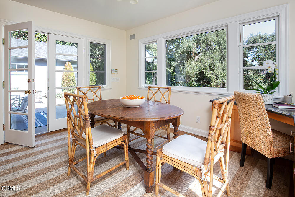 141 Sierra View Road Pasadena, CA 91105 - Photo 13 of 38 a view of a dining room with furniture and wooden floor