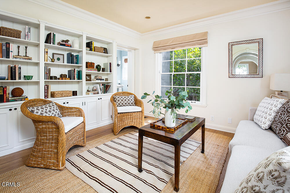 141 Sierra View Road Pasadena, CA 91105 - Photo 18 of 38 a living room with furniture and a book shelf