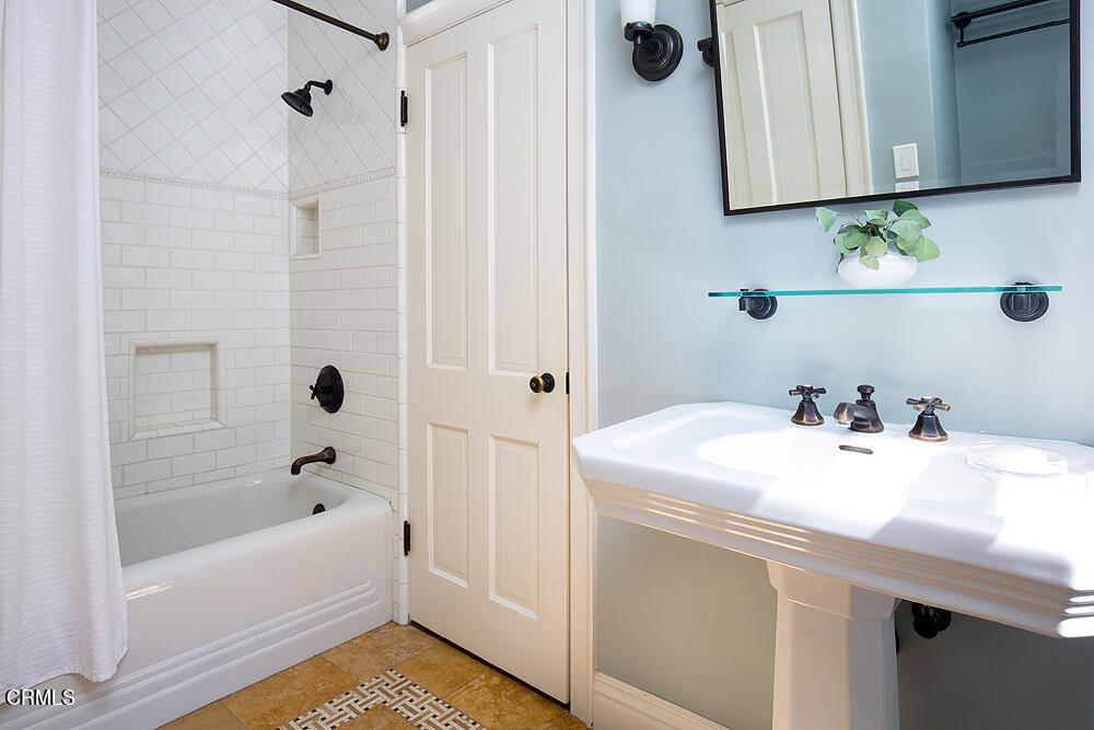 141 Sierra View Road Pasadena, CA 91105 - Photo 20 of 38 a bathroom with a sink and a bathtub