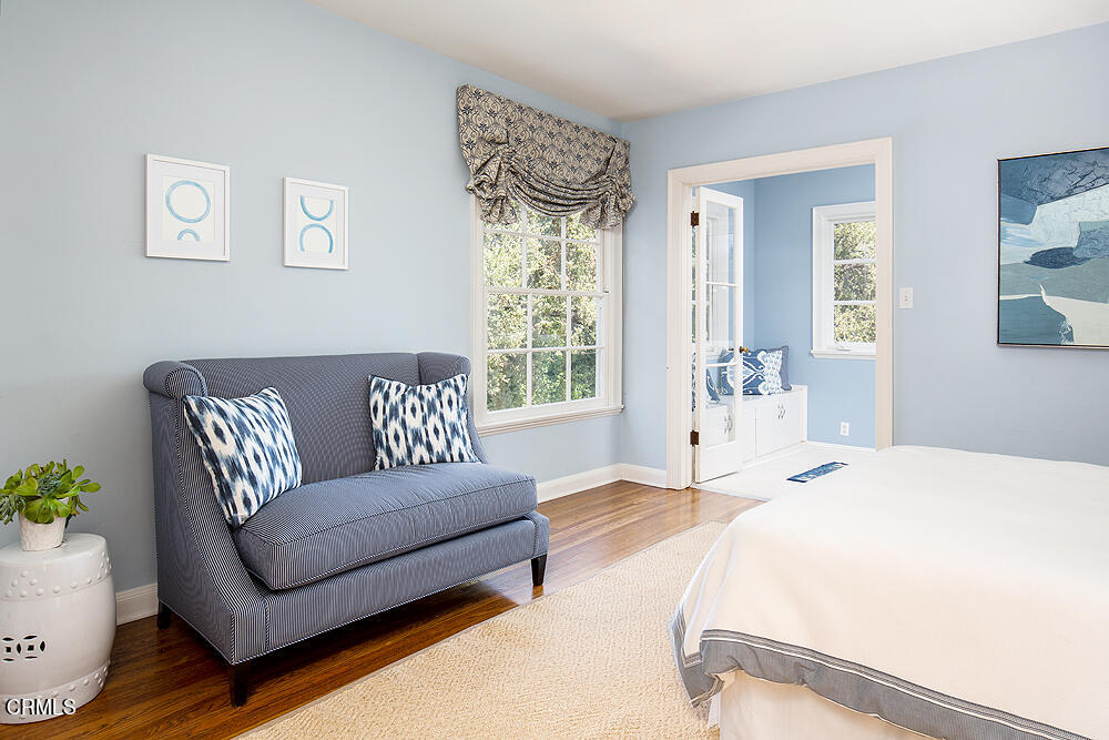 141 Sierra View Road Pasadena, CA 91105 - Photo 22 of 38 a living room with a bed furniture and a window