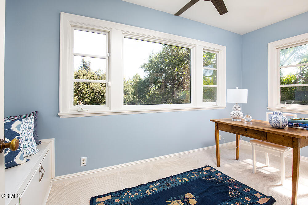 141 Sierra View Road Pasadena, CA 91105 - Photo 23 of 38 a bedroom with a bed and a window