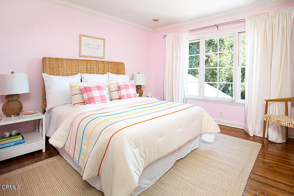 141 Sierra View Road Pasadena, CA 91105 - Photo 27 of 38 a bedroom with a bed and a large window