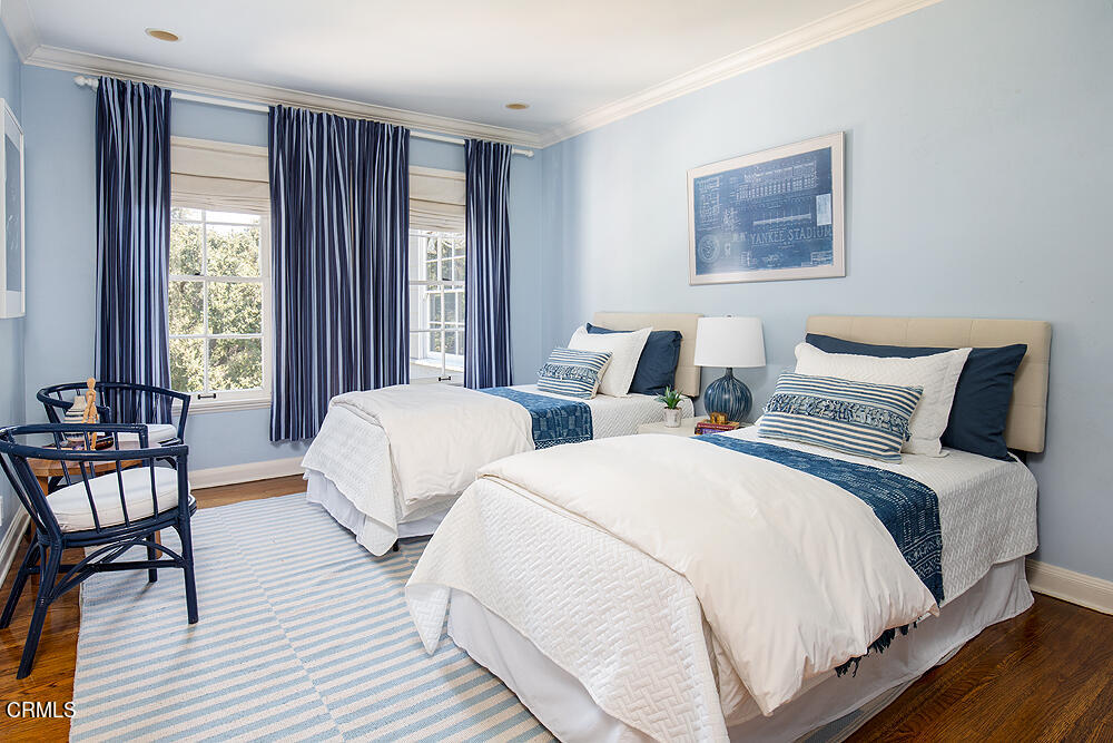 141 Sierra View Road Pasadena, CA 91105 - Photo 30 of 38 a bedroom with two beds and a large window