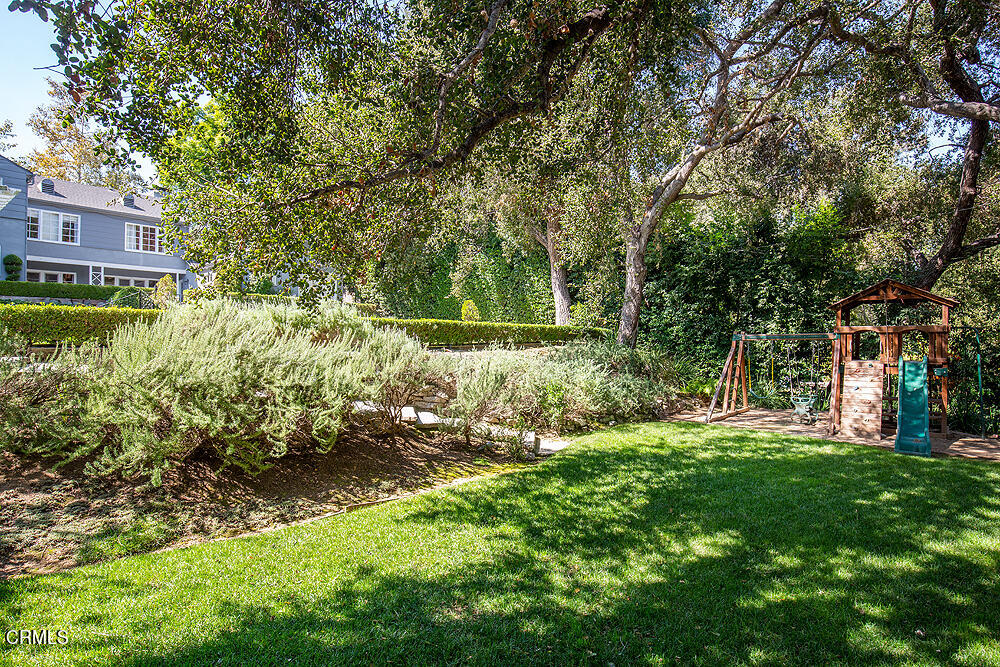 141 Sierra View Road Pasadena, CA 91105 - Photo 37 of 38 a view of a backyard with a garden