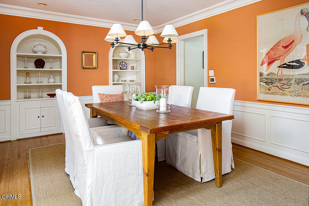 141 Sierra View Road Pasadena, CA 91105 - Photo 8 of 38 a dining room with a table and chairs