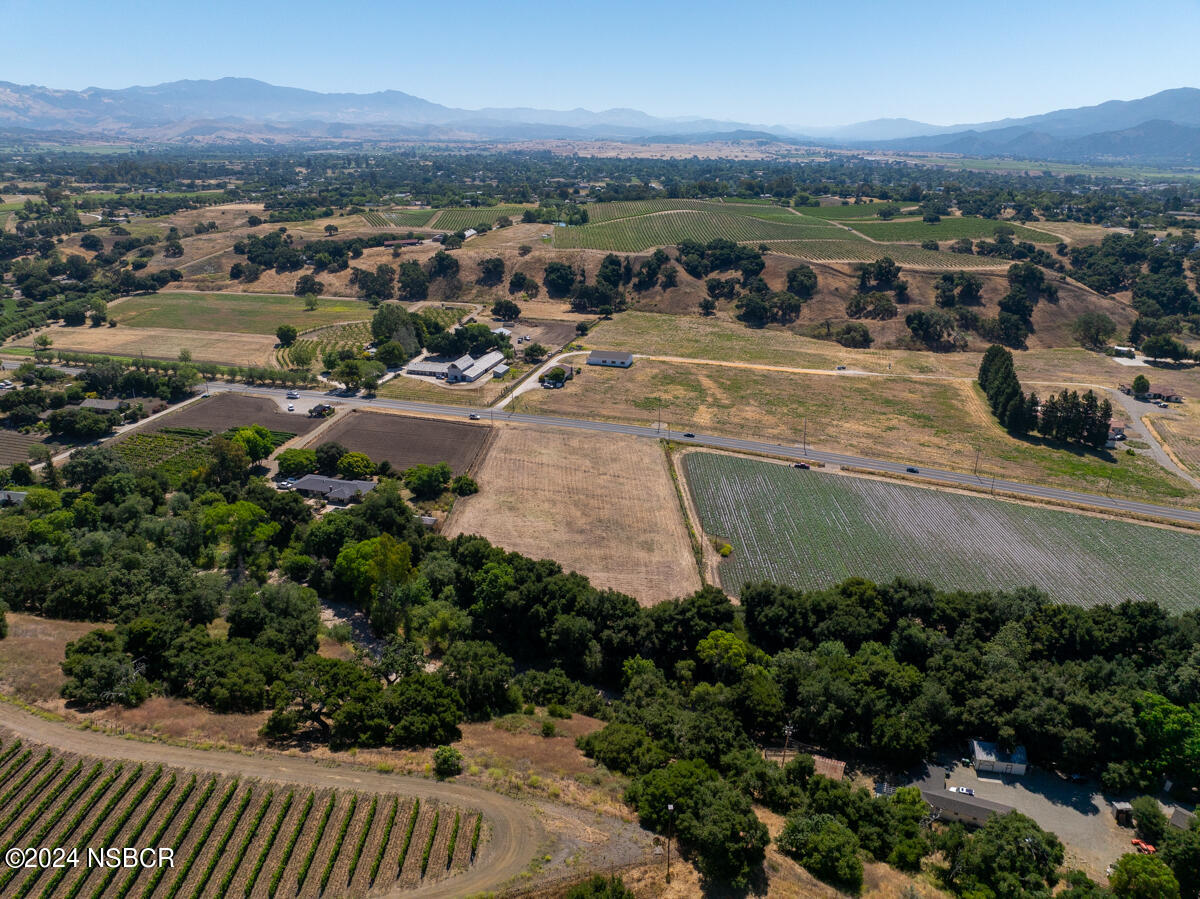 Alamo Pintado Road Solvang, CA 93463 - Photo 16 of 24 an aerial view of a town with couple of houses