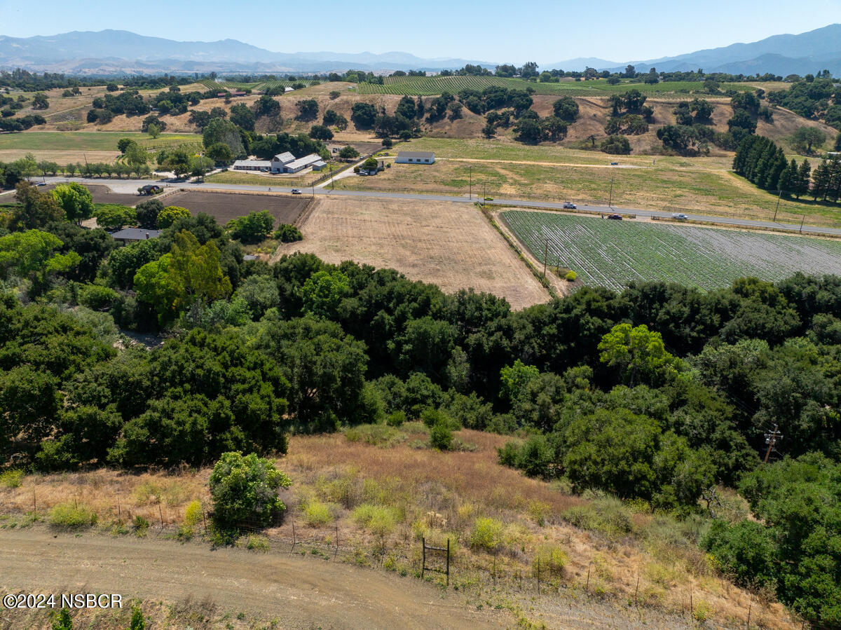 Alamo Pintado Road Solvang, CA 93463 - Photo 23 of 24 an aerial view of lake residential houses with outdoor space and trees
