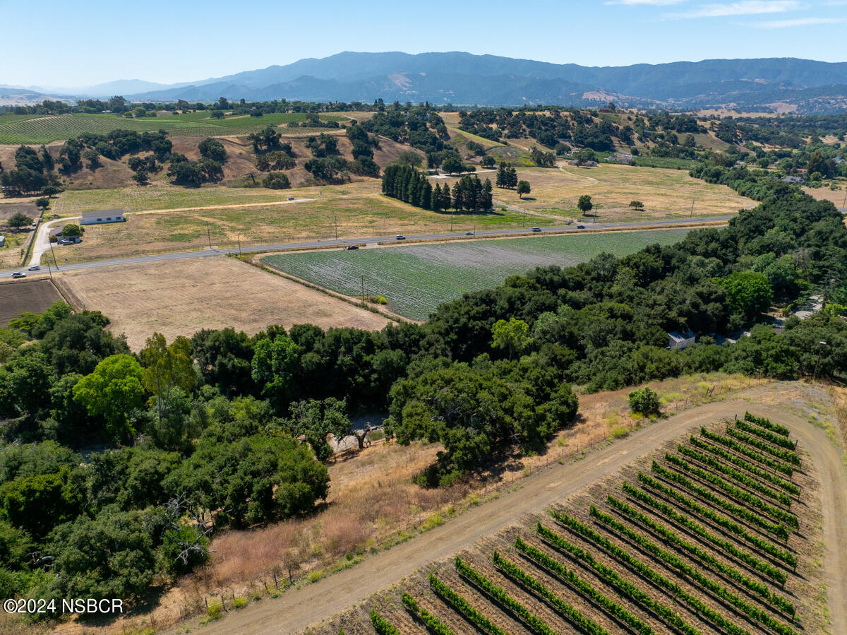 Alamo Pintado Road Solvang, CA 93463 - Photo 7 of 24 a view of a street with a building in the background