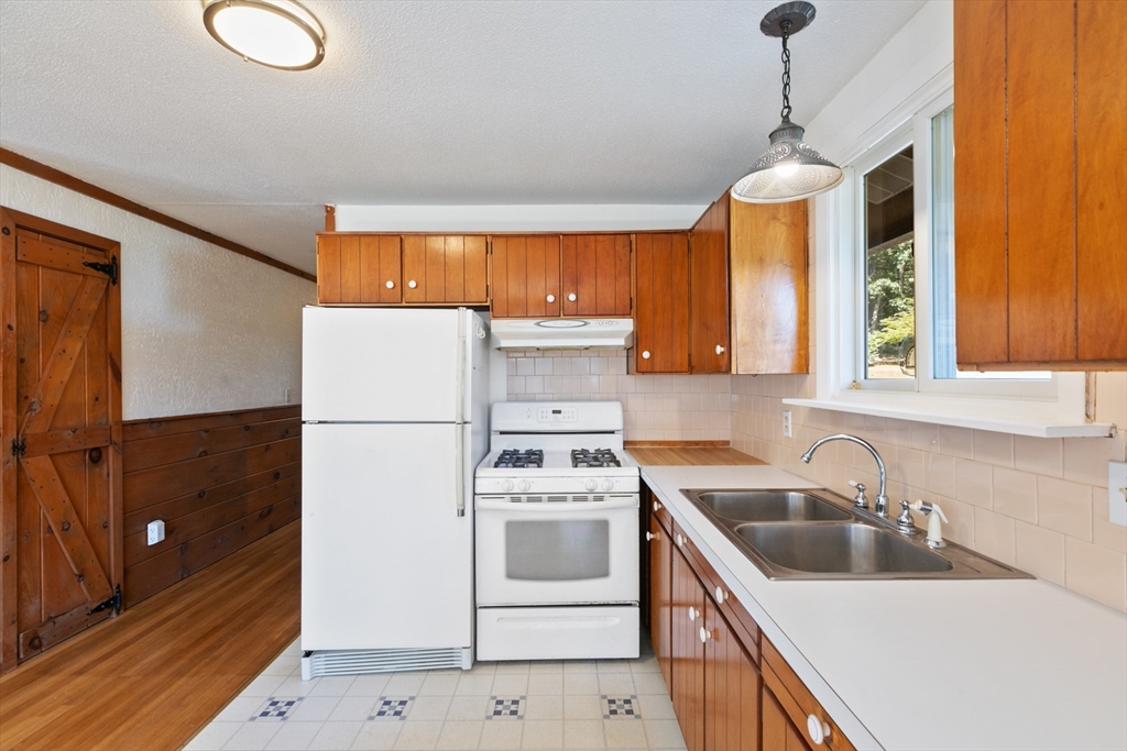 60 Park Road Charlton, MA 01507 - Photo 12 of 30 a kitchen that has a sink cabinets counter space and appliances