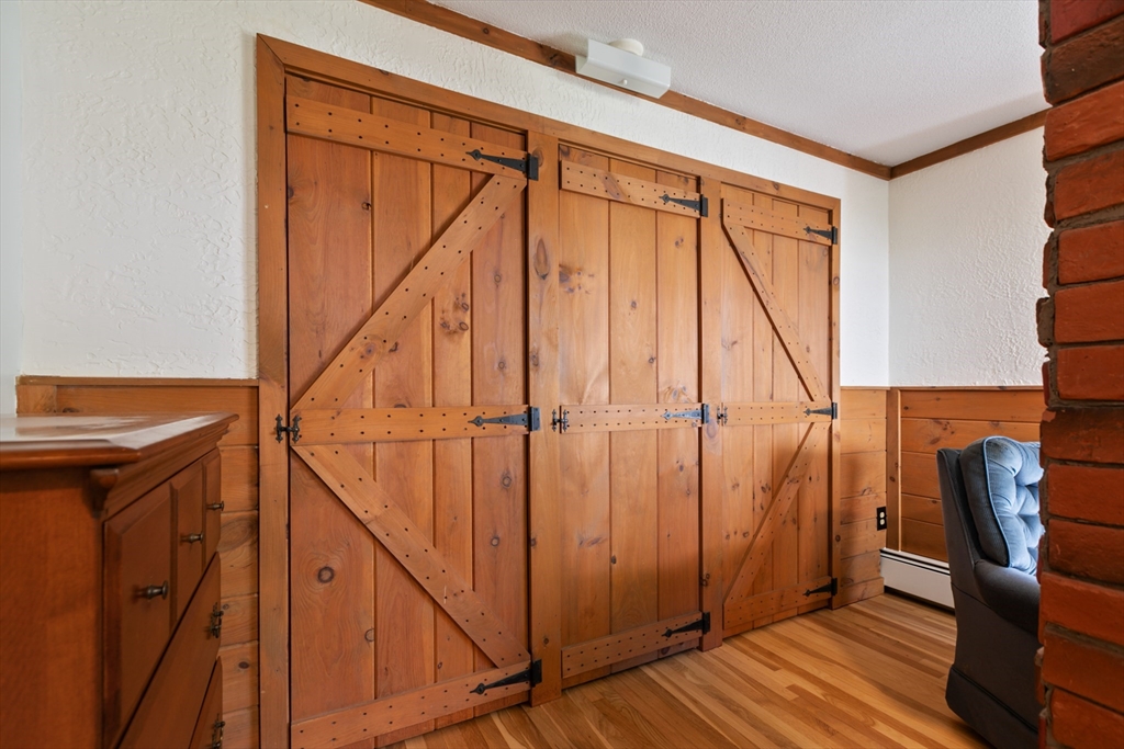 60 Park Road Charlton, MA 01507 - Photo 15 of 30 a view of a hallway with wooden floor and staircase