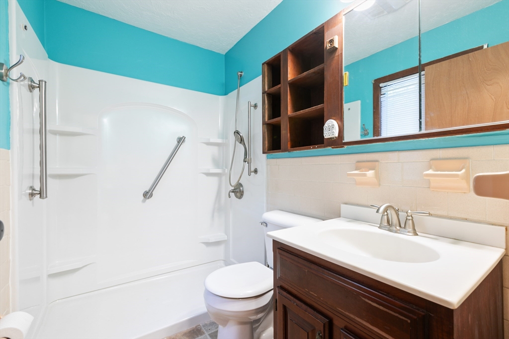 60 Park Road Charlton, MA 01507 - Photo 17 of 30 a bathroom with a sink toilet and shower