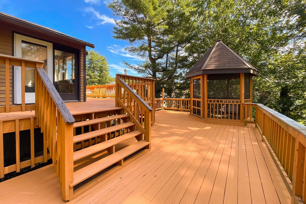 60 Park Road Charlton, MA 01507 - Photo 20 of 30 a view of wooden house with a large window and wooden floor