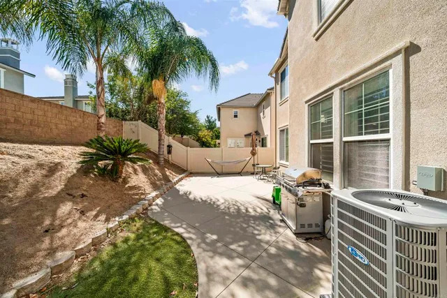 a view of a house with a patio