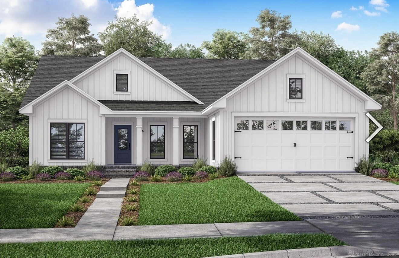 Reder Road Litchfield, CT 06759 - Photo 5 of 6 a view of a white house next to a yard with potted plants