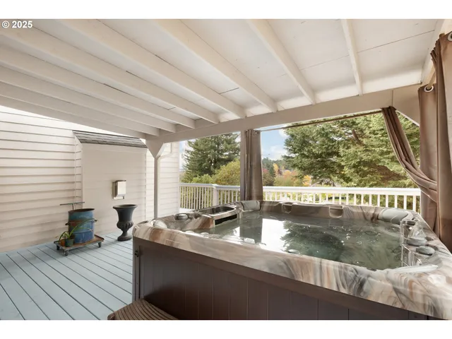 a balcony with wooden floor