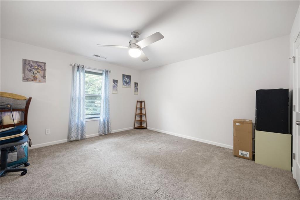 406 Splash Pointe Temple, GA 30179 - Photo 27 of 33 a view of an empty room with a cabinet