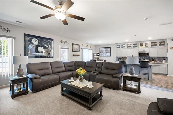 a living room with furniture and a window