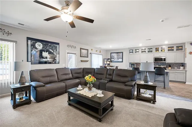 a living room with furniture and a window