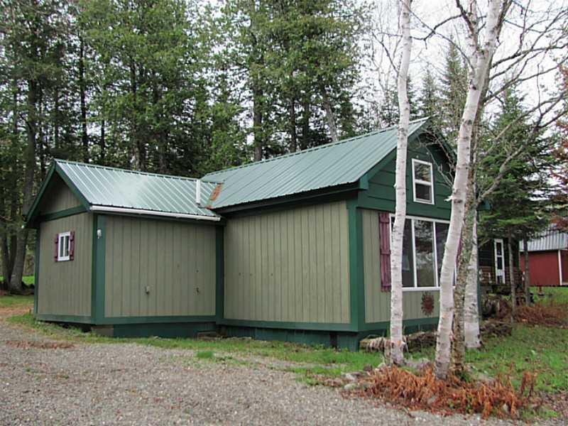 156 W Road Portage, ME 04768 - Photo 7 of 13 Exterior Front.