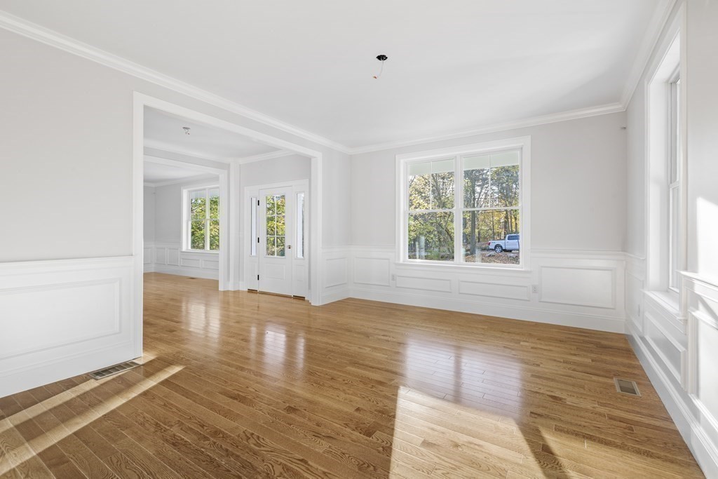 430 High Street Walpole, MA 02081 - Photo 14 of 42 an empty room with wooden floor and windows
