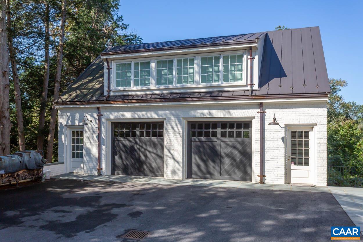 1340 Sunset Circle Charlottesville, VA 22901 - Photo 12 of 15 a front view of a house with garden