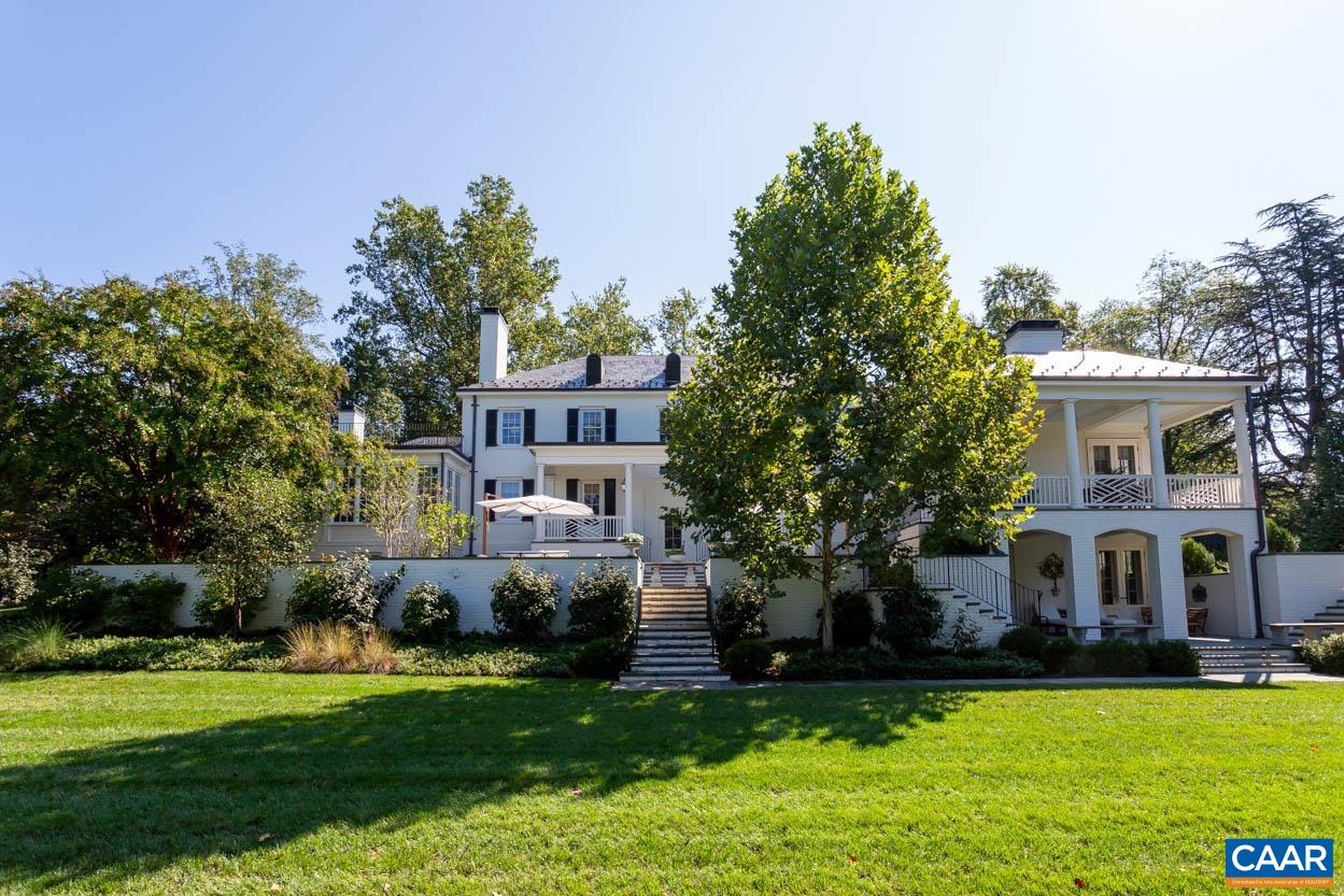 1340 Sunset Circle Charlottesville, VA 22901 - Photo 9 of 15 a front view of a house with a garden