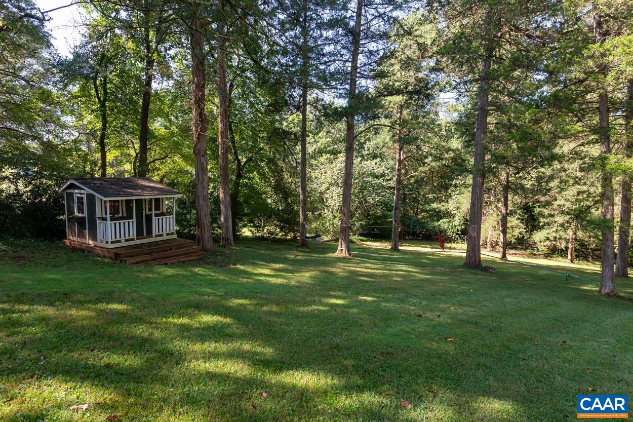 1340 Sunset Circle Charlottesville, VA 22901 - Photo 10 of 15 a view of a house with a garden
