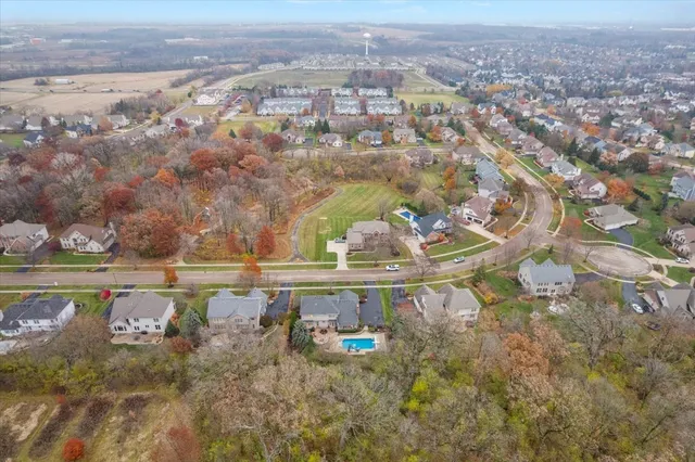 an aerial view of residential house with outdoor space