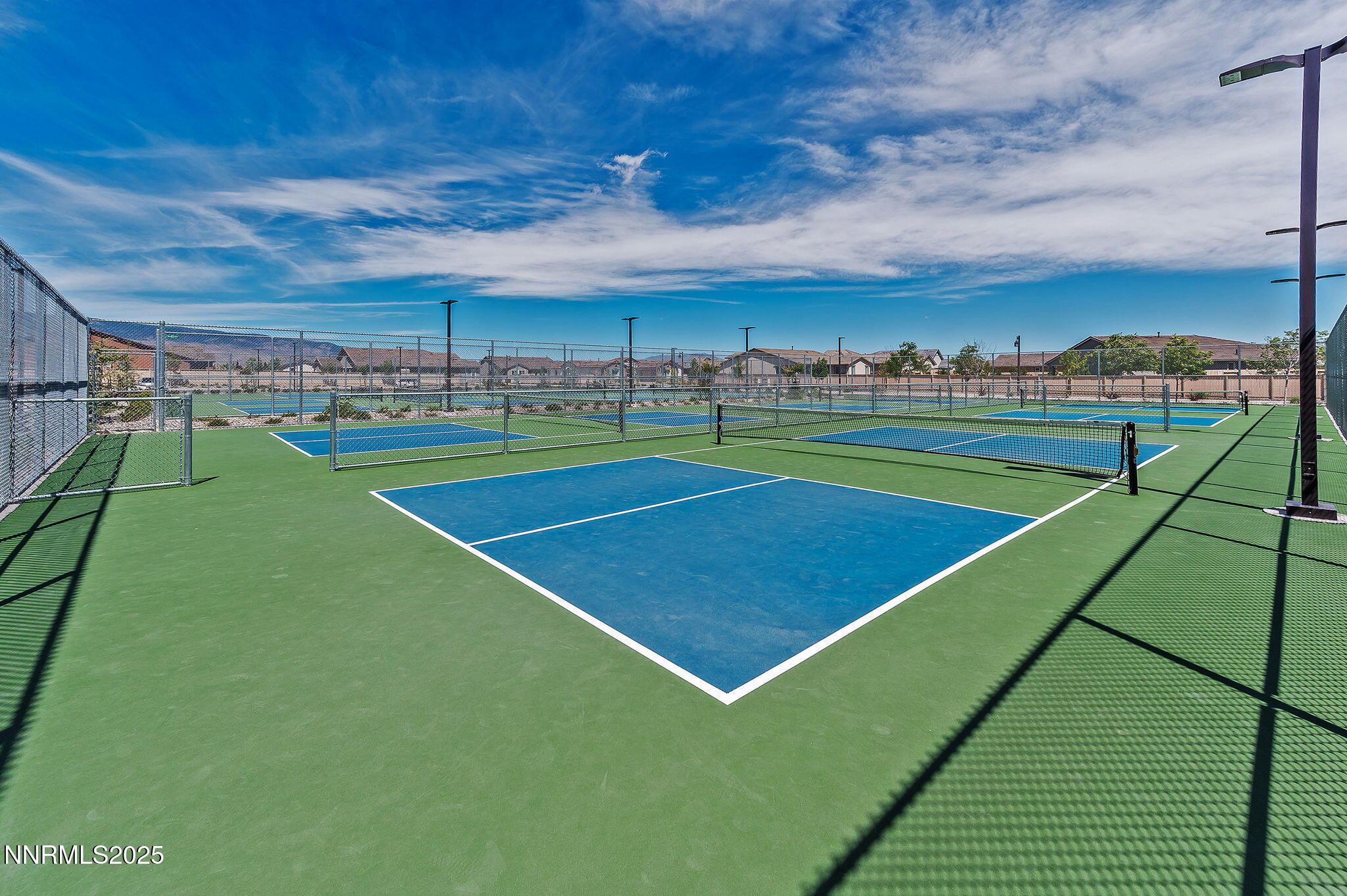 10035 Ellis Park Lane Reno, NV 89521 - Photo 50 of 52 a view of tennis court with a big yard