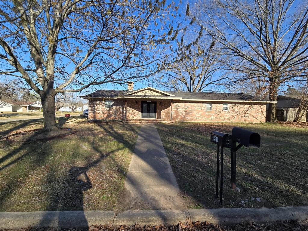 201 Robin Way Mount Vernon, TX 75457 - Photo 2 of 28 a picture of trees