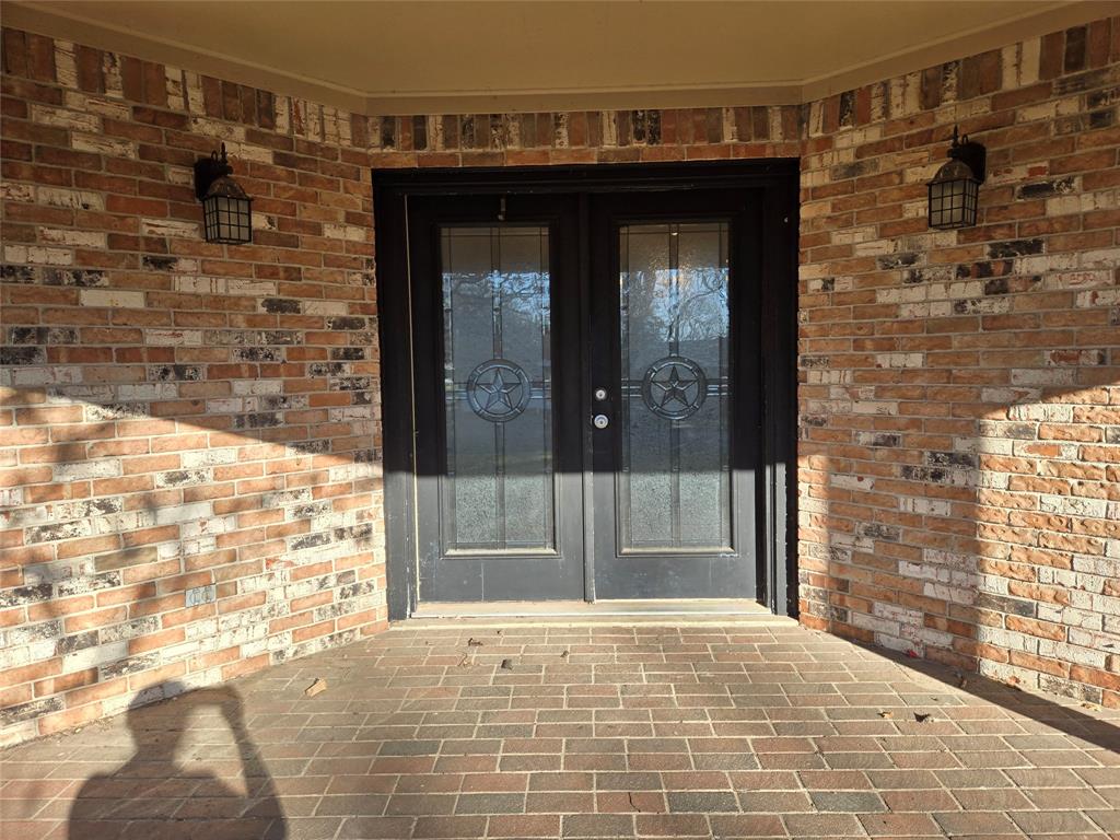 201 Robin Way Mount Vernon, TX 75457 - Photo 5 of 28 a view of entrance door of the house