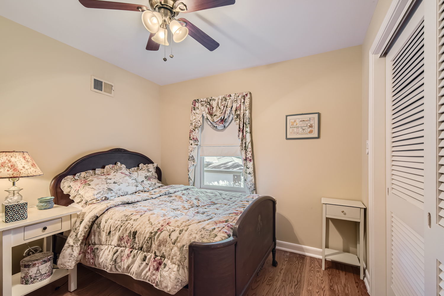 207 Scottswood Road Riverside, IL 60546 - Photo 26 of 32 a bedroom with a bed and a chandelier