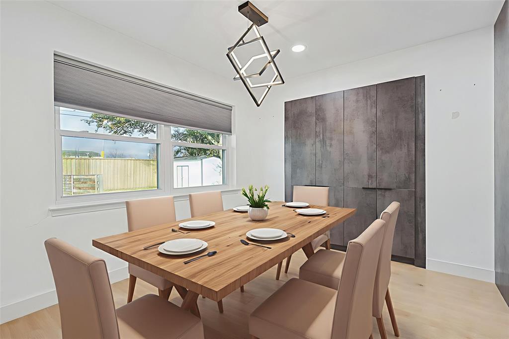 12417 Quincy Lane Dallas, TX 75230 - Photo 11 of 40 a view of a dining room with furniture window and outside view