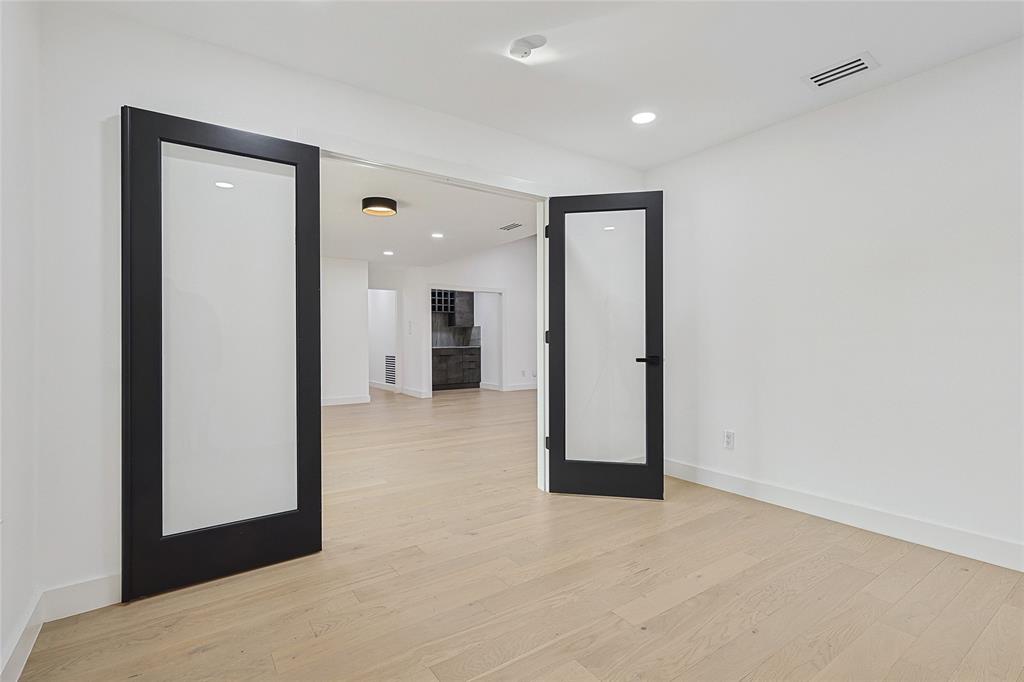 12417 Quincy Lane Dallas, TX 75230 - Photo 14 of 40 a view of a big room with closet and windows