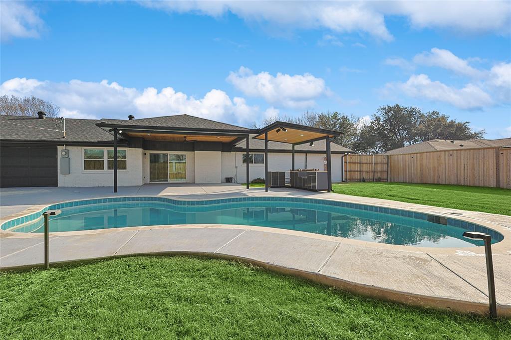 12417 Quincy Lane Dallas, TX 75230 - Photo 37 of 40 a view of house with a big yard