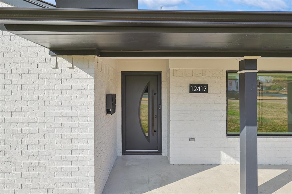 12417 Quincy Lane Dallas, TX 75230 - Photo 6 of 40 a view of wooden door
