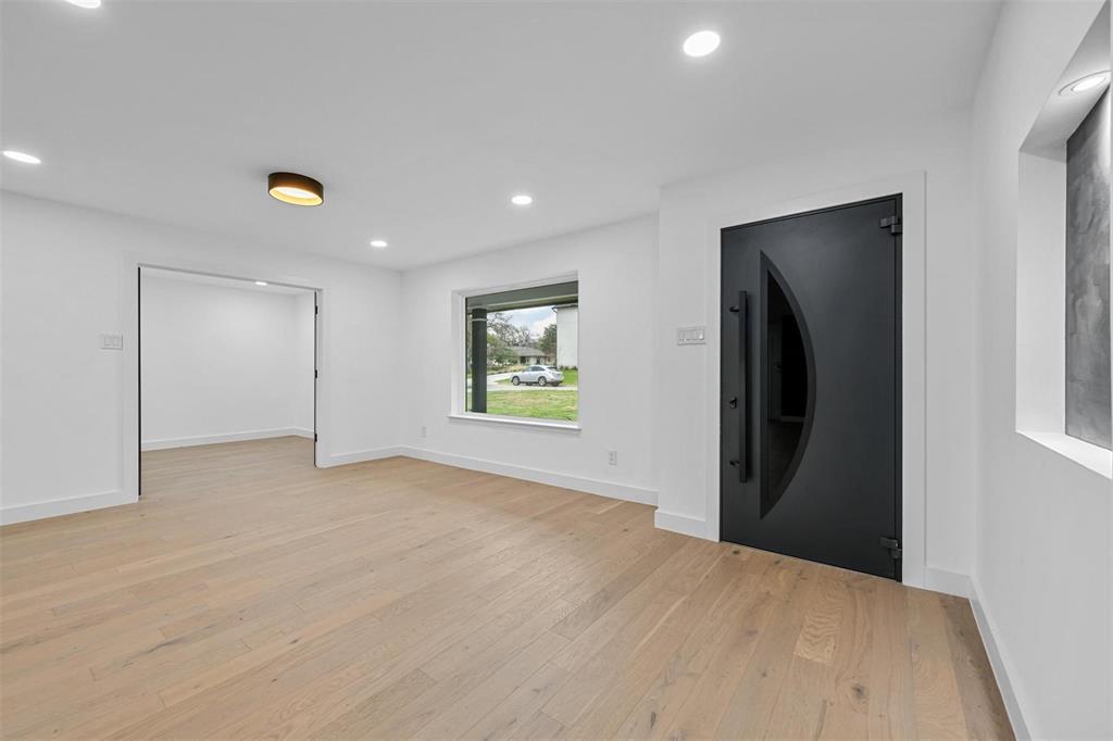 12417 Quincy Lane Dallas, TX 75230 - Photo 7 of 40 a view of an empty room with a window