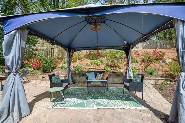 a view of chair and table in the patio