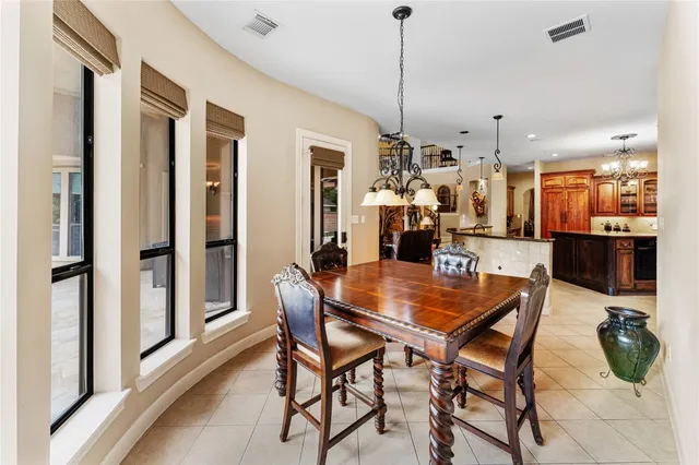 a bedroom with bed and wooden floor