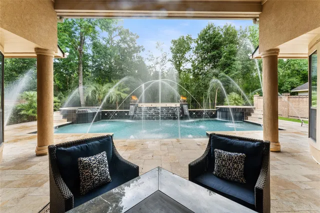 a wooden bench sitting in front of a building