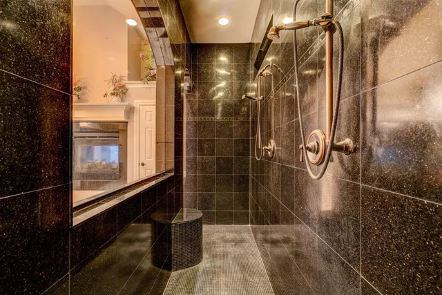 a view of storage and utility room with wooden floor